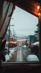 Frosty Window View with Street Lights on a Chilly Day