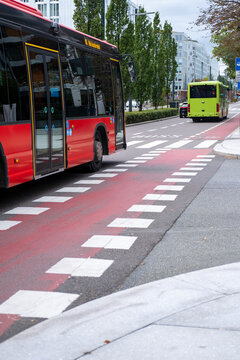 Modern urban transport infrastructure with dedicated bus lane in Oslo city, highlighting mobility, europe context and contemporary public transit design