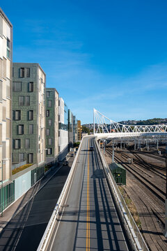 Modern urban transport infrastructure with railway lines in Oslo city, strong perspective view emphasizing mobility, europe connection and contemporary design