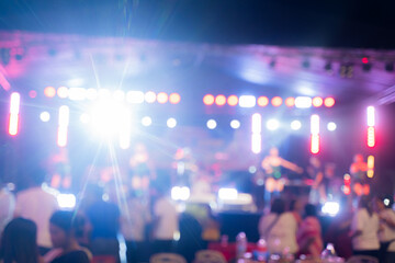 A blurry concert backdrop on a tropical resort beach &ndash; this concept could be used for New Year's celebrations, including in Phuket, Thailand.
