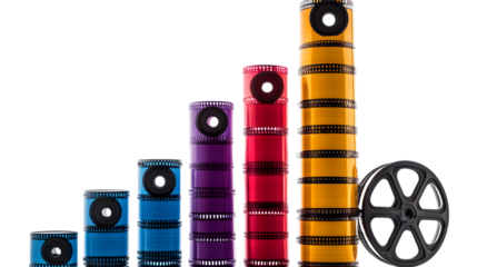 Stacks of colorful film reels arranged in a bar graph formation, isolated on transparent background, depicting visual data