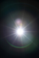 Sun flare on the black background