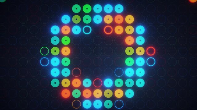 Glowing colorful digital circles lights on led screen. Retro gaming style. Seamless loop.