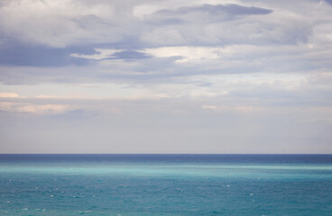 Fototapeta premium Ionian sea seen from Giardini Naxos in the Metropolitan City of Messina on the island of Sicily, Italy