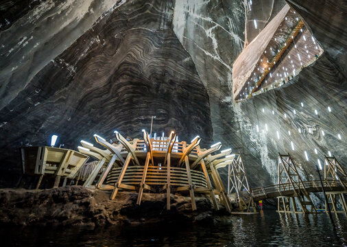 Underwater lake and wooden construction in Terezia mine, Salina Turda salt mine in Turda, Romania