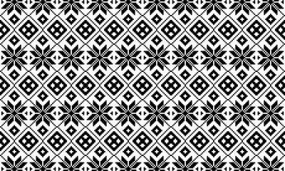 black and white geometric pixel pattern with abstract floral motifs background. retro ornamental.