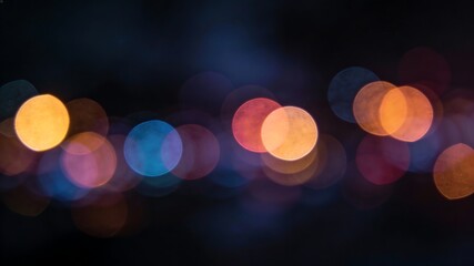 Abstract bokeh lights against a dark background creating a dreamy atmosphere