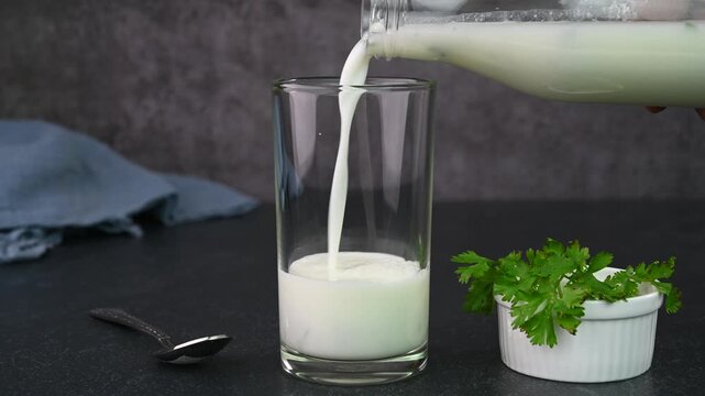 Serving buttermilk drink in a glass cup.