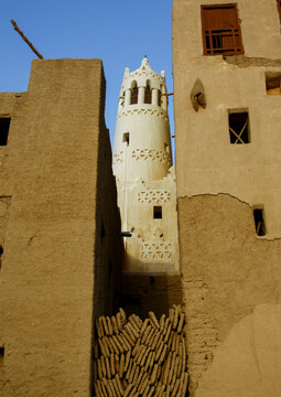 Mosque between mud skyscrapers, Hadhramaut, Shibam, Yemen