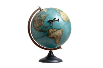 Model airplane flying over a vintage globe against a black background, representing global travel. isolated on white background
