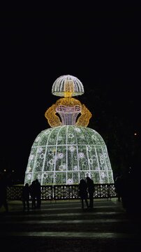 Madrid, Spain, 12022025 , Illuminated Menina christmas lights sculpture at night