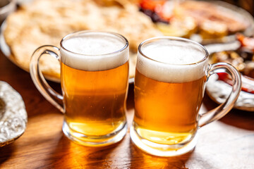 Two Glasses Of Fresh Draft Beer