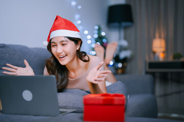 Young woman enjoying virtual Christmas video call