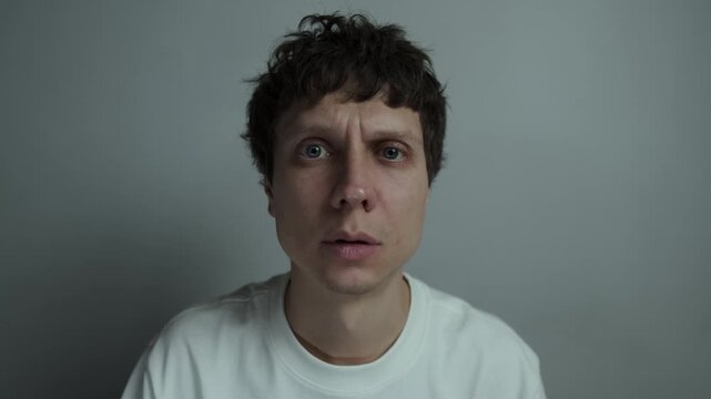 Man realizing something is terribly wrong and staring in disbelief