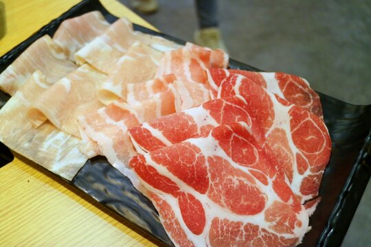 Thin Slices of Pork Belly on Plate