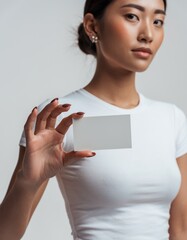 Beautiful Asian Woman Holding Blank Business Card Mockup
