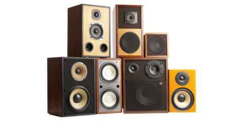 Pile of vintage speakers stacked in collection concept. Collection of audio speakers in various designs and sizes.