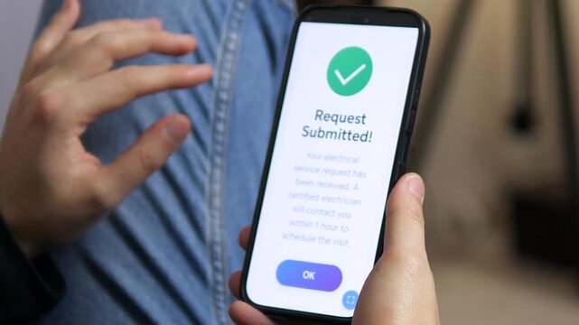 Help secured in seconds. This video captures the satisfying conclusion of submitting a request for an electrician, highlighted by a clear on-screen success notification.
