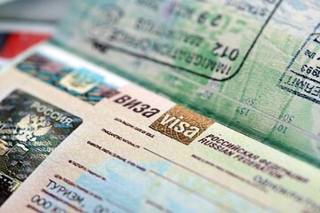 Fragment of Russian Federation visa in passport page close up. Concept of travel and tourism worldwide