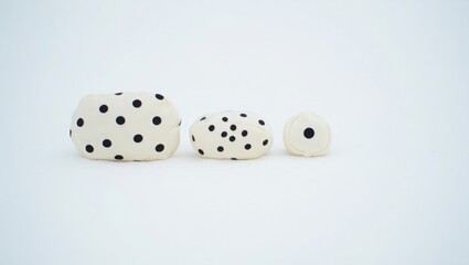 Cushion with polka dots on a white background