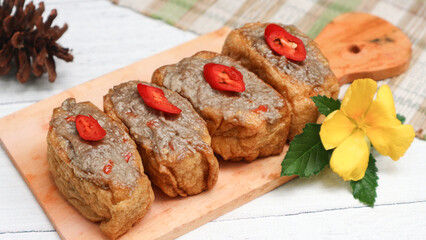 Bakso tahu, also known as tahu bakso, a popular savory snack of fried tofu skin filled with minced meat and tapioca flour.
