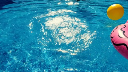 Floating Pink Flamingo Inflatable Toy in Blue Pool Water