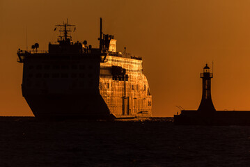 
PASSENGER FERRY - A ship at sea in the morning sun
