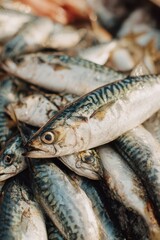 Obraz premium Fresh Mackerel: A vibrant close-up captures a pile of fresh mackerel, showcasing their iridescent scales and glistening flesh. A visual treat for seafood enthusiasts.