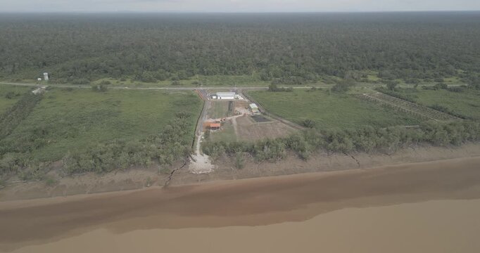 Aerial Drone View A Petrol Station On The Way To Batang Lupar Ferry Terminal And To The New Bridge Project Under Construction,When Complete Will Conected Both Side For Transportation.