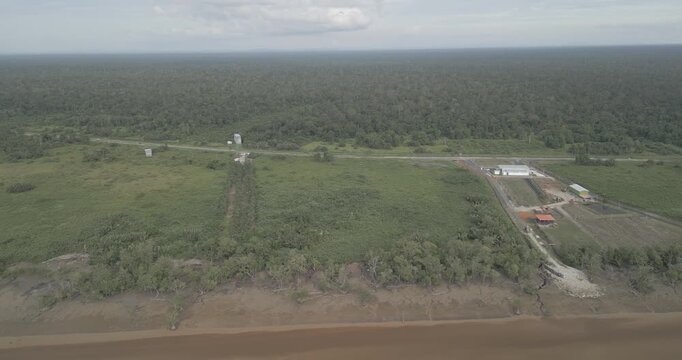 Aerial Drone View A Petrol Station On The Way To Batang Lupar Ferry Terminal And To The New Bridge Project Under Construction,When Complete Will Conected Both Side For Transportation.
