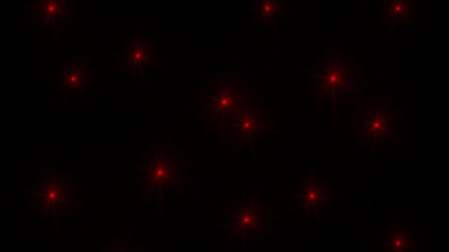 Soft red fairy lights twinkling against black background. Perfect for Christmas, holiday, or magical overlays. Seamless loop