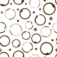 Coffee stains and drops seamless pattern. Brown shape of coffee cup bottom rings and splashes. Grunge circles and splatter. Vector background for fabric, textile, wallpaper, wrapping paper, etc.