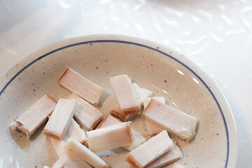 Cubes of Delightful Lard Await in speckled bowl, ready for culinary enchantment