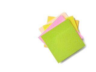 Blank colorful sticky note isolated on white background. Top view, copy space 