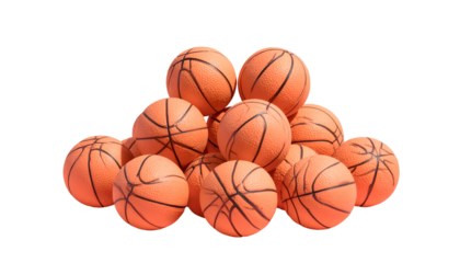 A pyramid of orange basketballs sits against a stark black background