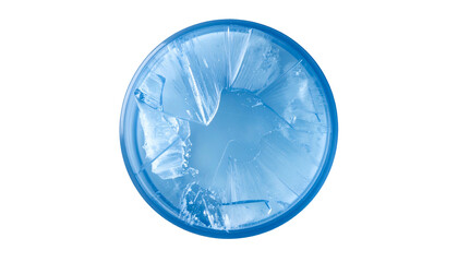 Overhead view of shattered, translucent blue glass within a circular frame, against black background