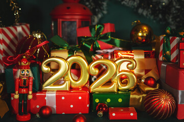 Gold numbers 2026, Christmas decor and elegant red and green gift boxes.