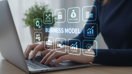 Hands working on a laptop with a digital overlay showcasing key aspects of a successful business model.