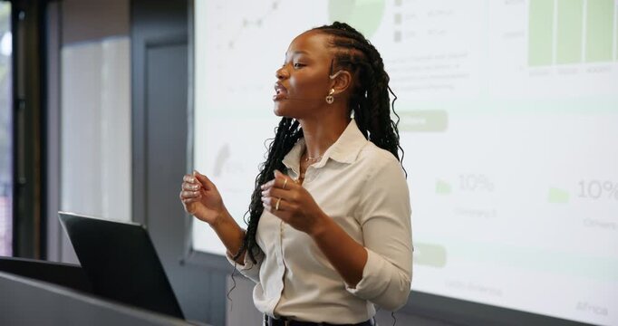 Data, laptop and presentation with business black woman at podium for development workshop. Computer, projection screen and statistics with speaker in convention center for market research symposium