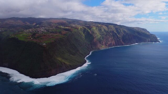 Farol da Ponta do Pargo Ilha da Madeira. Lighthouse Ponta do Pargo - Madeira Portugal - travel background. Aerial drone cinematic 4k video. 