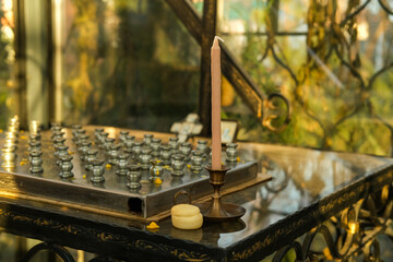 Lit candles in the Orthodox Church.