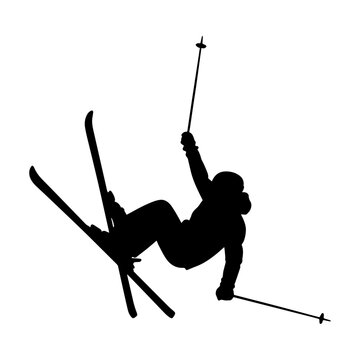 Dynamic silhouette of a skier in mid air performing an acrobatic jump.