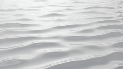 Obraz premium Silver ripples create a subtle yet compelling abstract wave texture surface image