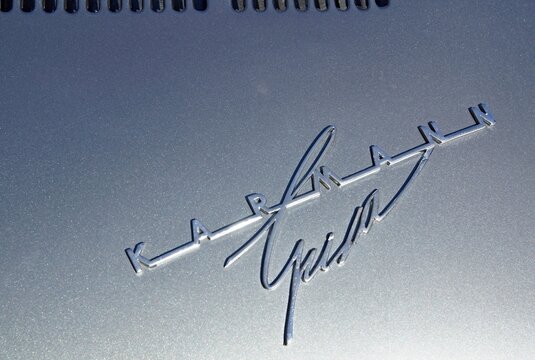 Karmann Ghia emblem shining on classic car