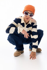 Stylish teenager showcases unique fashion sense with confidence in vibrant outfit © Bliss