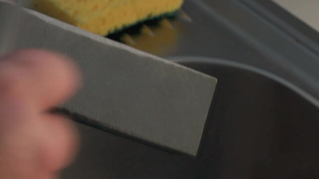 Sharpening a kitchen knife with precision for effective cooking
