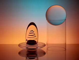 Different glass items with colorful lighting