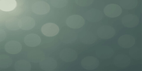 Abstract blue bokeh light background with glowing circles and winter holiday sparkle