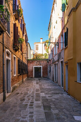Calle del Campaniel, a narrow pedestrian street in the San Polo district of Venice, Italy.