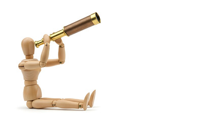 望遠鏡で未来のビジョンを展望するデッサン人形